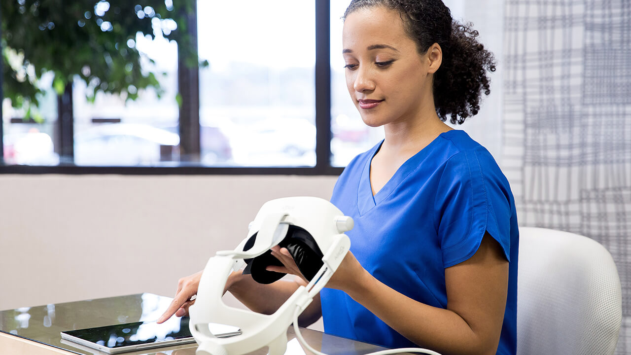 AdaptDx Pro headset on woman's head